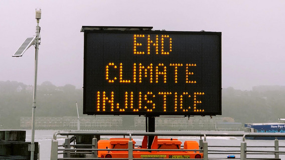Anzeigetafel: End Climate Injustice