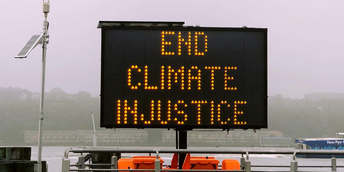 Anzeigetafel: End Climate Injustice